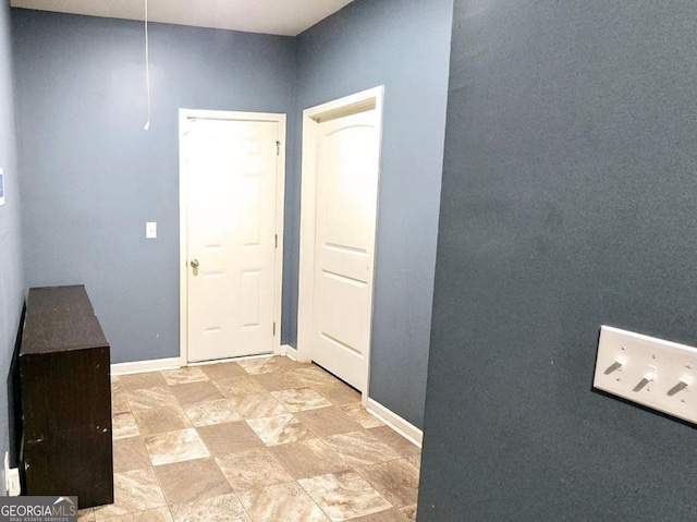 113 Citadel Dr, Hampton, GA 30228 - hall with light stone finish flooring and baseboards