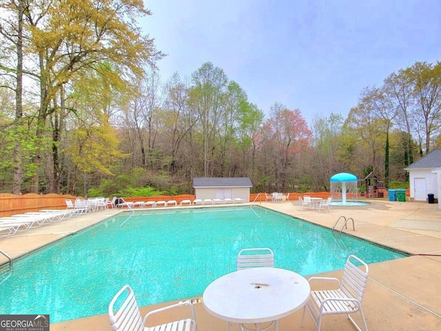 113 Citadel Dr, Hampton, GA 30228 - community pool with a patio area
