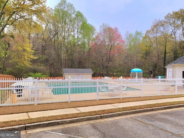 113 Citadel Dr, Hampton, GA 30228 - view of pool featuring an outdoor structure