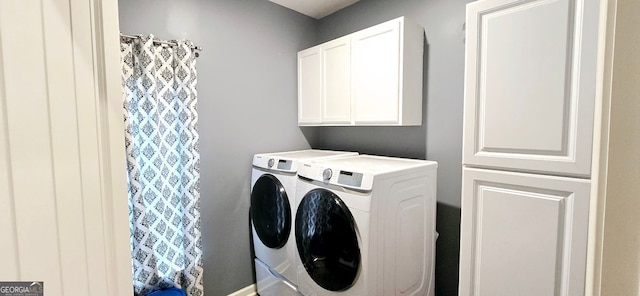 113 Citadel Dr, Hampton, GA 30228 - laundry room featuring washer and dryer and cabinet space