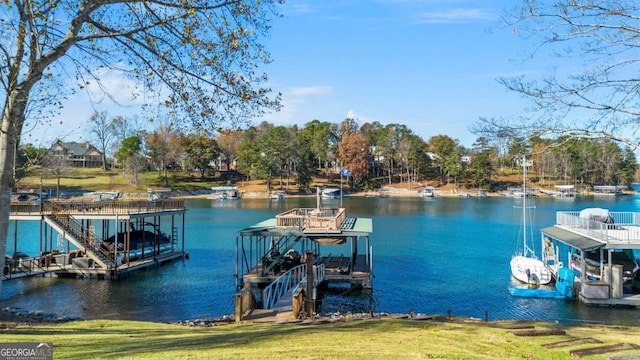 dock area with a water view