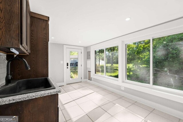 5198 Holly Springs Rd, Pendergrass, GA 30567 - unfurnished sunroom featuring a sink