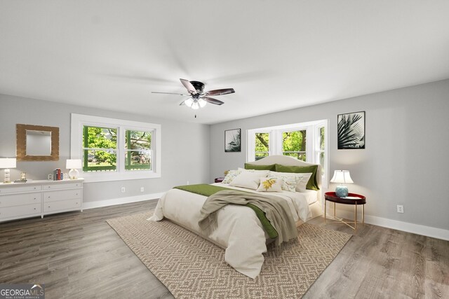 5198 Holly Springs Rd, Pendergrass, GA 30567 - bedroom featuring baseboards, ceiling fan, and wood finished floors