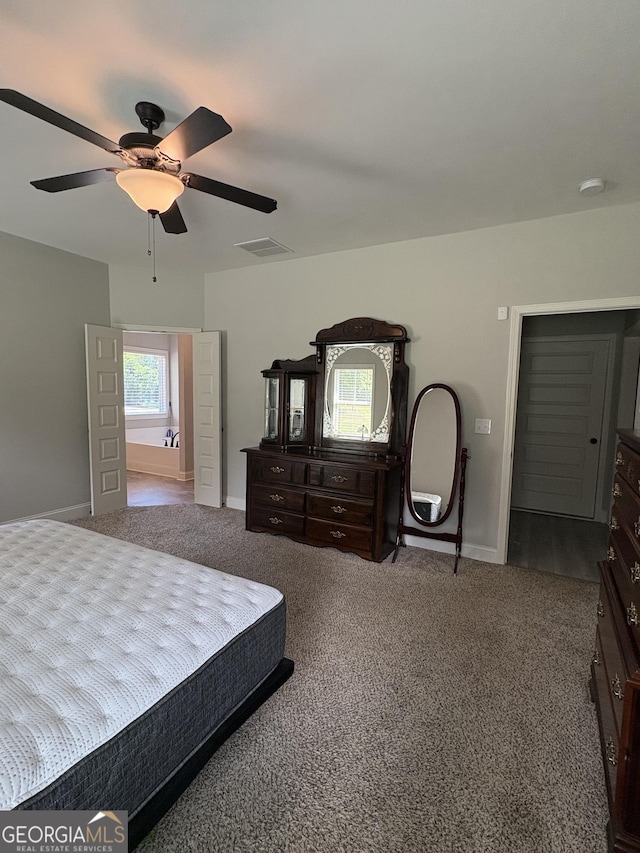 4529 Jersey Covington Rd, Covington, GA 30014 - bedroom featuring carpet flooring, baseboards, and ceiling fan