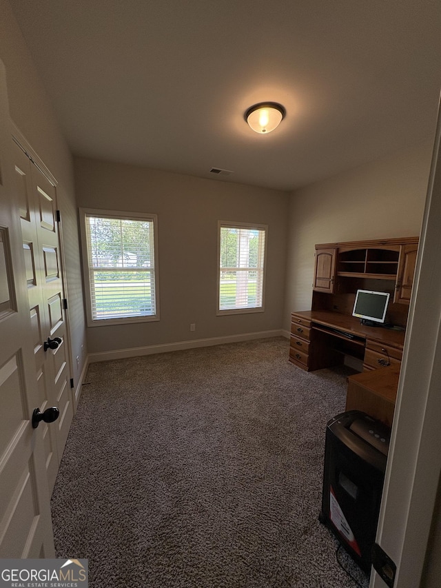 4529 Jersey Covington Rd, Covington, GA 30014 - unfurnished office with healthy amount of natural light, baseboards, and carpet flooring