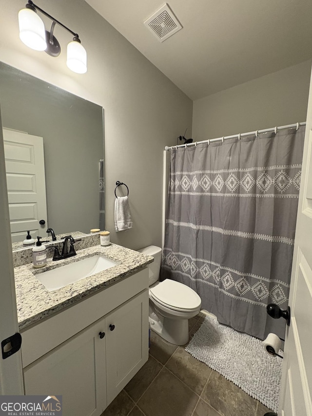 4529 Jersey Covington Rd, Covington, GA 30014 - bathroom with vanity, tile patterned flooring, toilet, and a shower with curtain
