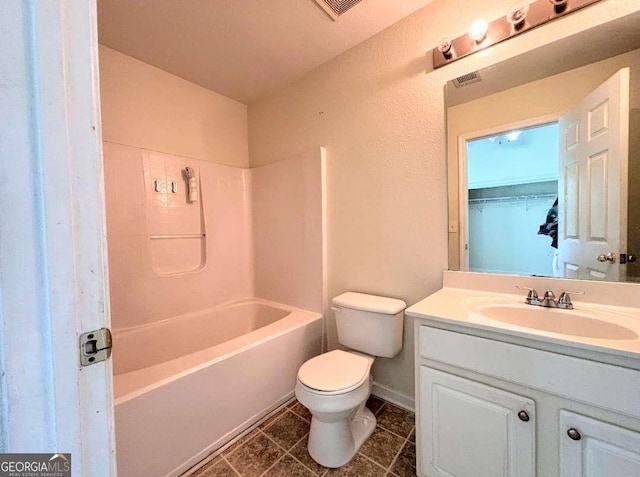 290 Brookview Dr, Riverdale, GA 30274 - bathroom with visible vents, washtub / shower combination, toilet, vanity, and tile patterned flooring