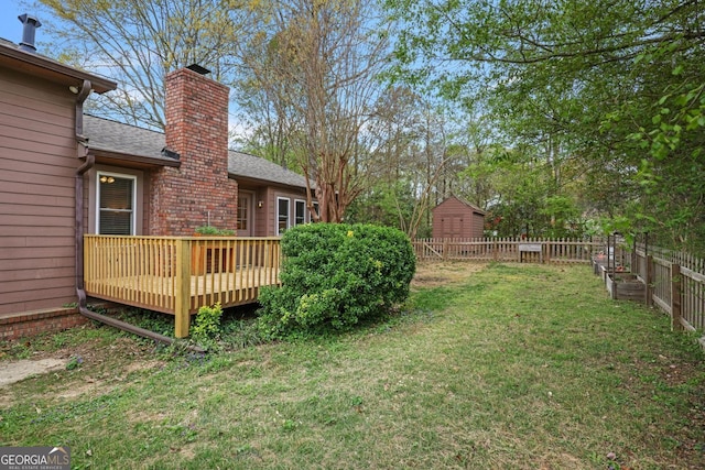 3916 S Martin Way, Lithia Springs, GA 30122 - view of yard featuring a fenced backyard and a wooden deck