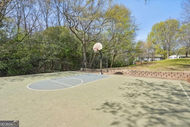 view of sport court with fence and community basketball court