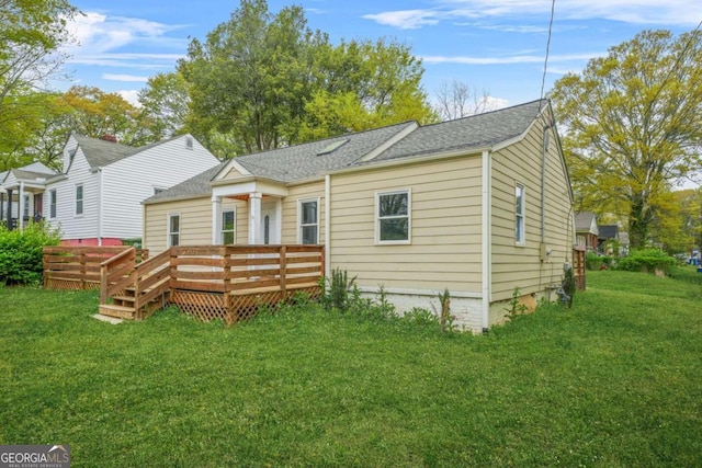 1159 Fair St SW, Atlanta, GA 30314 - back of property featuring a wooden deck, a yard, and a shingled roof