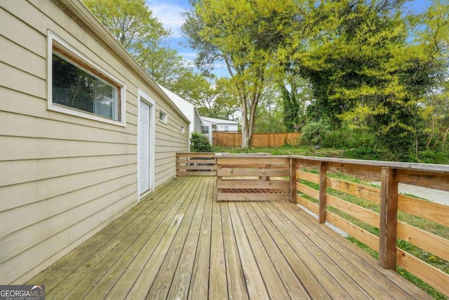wooden terrace with fence