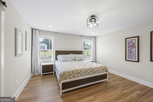 209 Unawatti Rd, Canon, GA 30520 - bedroom with recessed lighting, baseboards, and dark wood finished floors