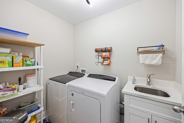 209 Unawatti Rd, Canon, GA 30520 - washroom with washing machine and clothes dryer, cabinet space, and a sink