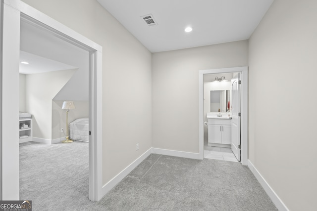 209 Unawatti Rd, Canon, GA 30520 - corridor featuring visible vents, baseboards, recessed lighting, a sink, and carpet floors