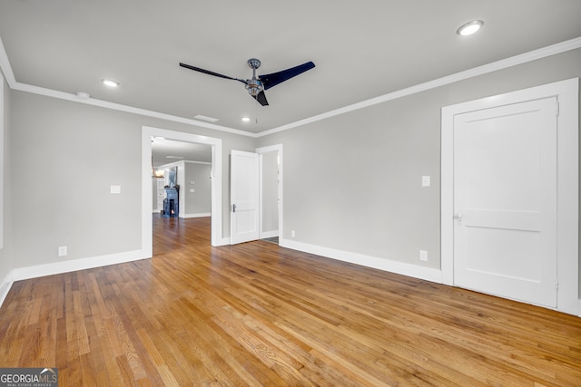68 Hayes St, Toccoa, GA 30577 - spare room with ceiling fan, recessed lighting, baseboards, crown molding, and light wood-type flooring
