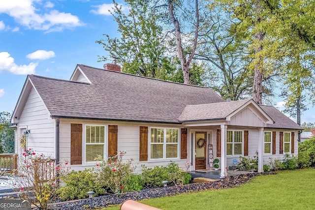 68 Hayes St, Toccoa, GA 30577 - view of front of property with a front yard, a shingled roof, and a chimney