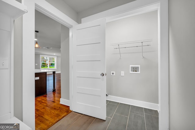 68 Hayes St, Toccoa, GA 30577 - laundry area featuring washer hookup, dark wood finished floors, electric dryer hookup, and baseboards