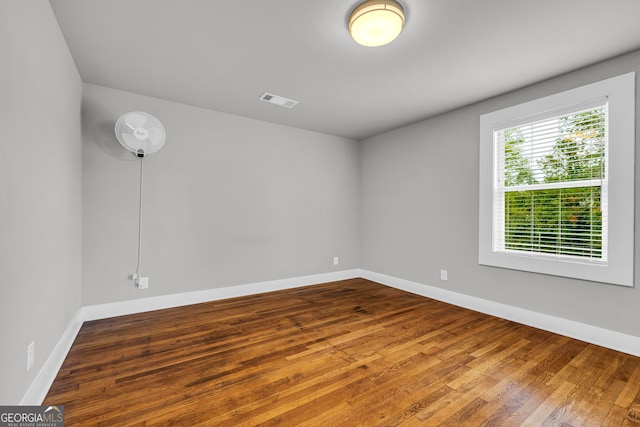 68 Hayes St, Toccoa, GA 30577 - empty room with wood finished floors and baseboards