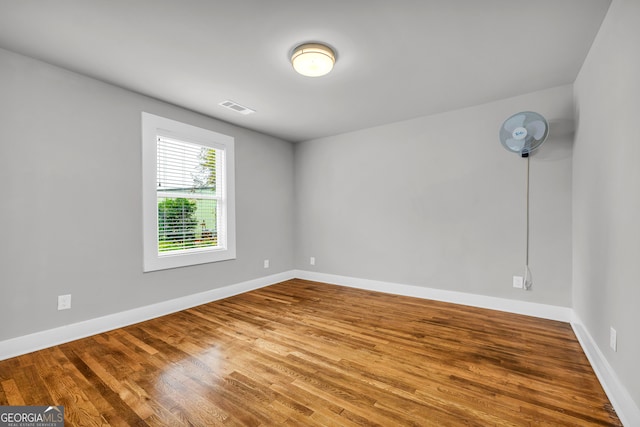 68 Hayes St, Toccoa, GA 30577 - empty room with wood finished floors and baseboards