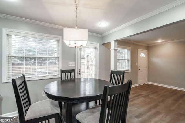 771 Jordan Ln Unit K, Decatur, GA 30033 - dining space featuring decorative columns, dark wood finished floors, ornamental molding, a chandelier, and recessed lighting