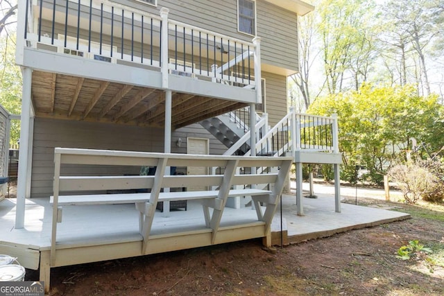 deck featuring stairway