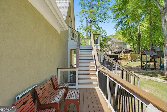 wooden terrace with fence and stairway