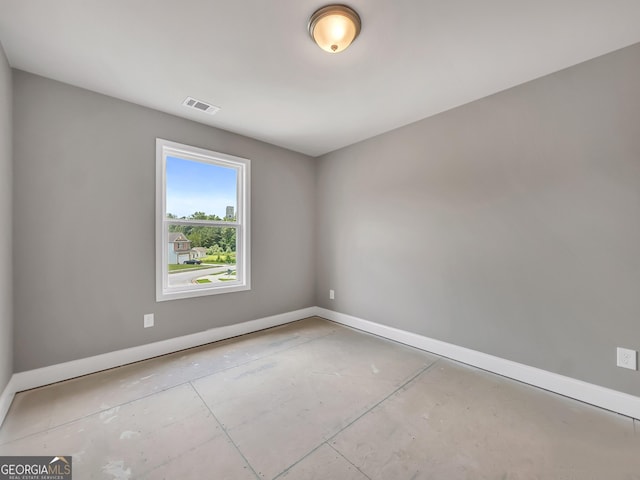 105 Hunts Mill Cir, Griffin, GA 30224 - spare room featuring baseboards