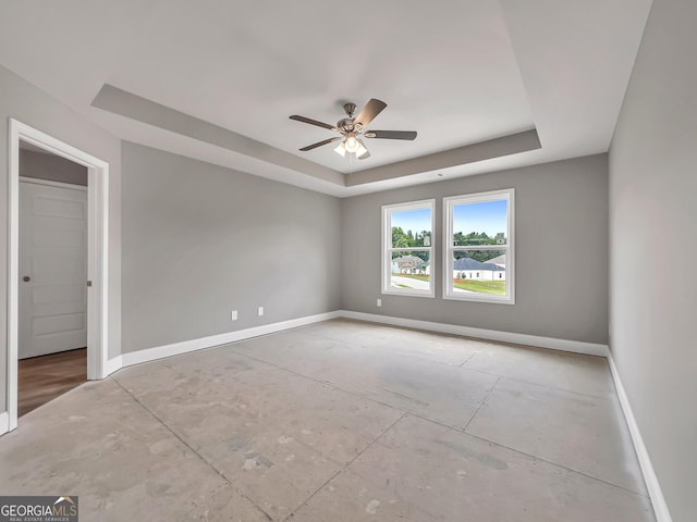 105 Hunts Mill Cir, Griffin, GA 30224 - empty room featuring a tray ceiling and ceiling fan