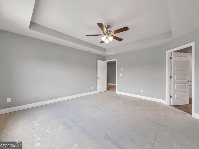 105 Hunts Mill Cir, Griffin, GA 30224 - spare room featuring a raised ceiling and ceiling fan