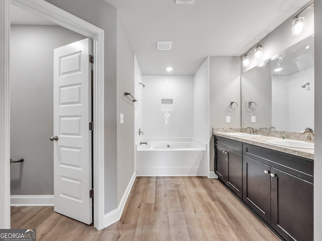 105 Hunts Mill Cir, Griffin, GA 30224 - full bath with wood finished floors and double vanity