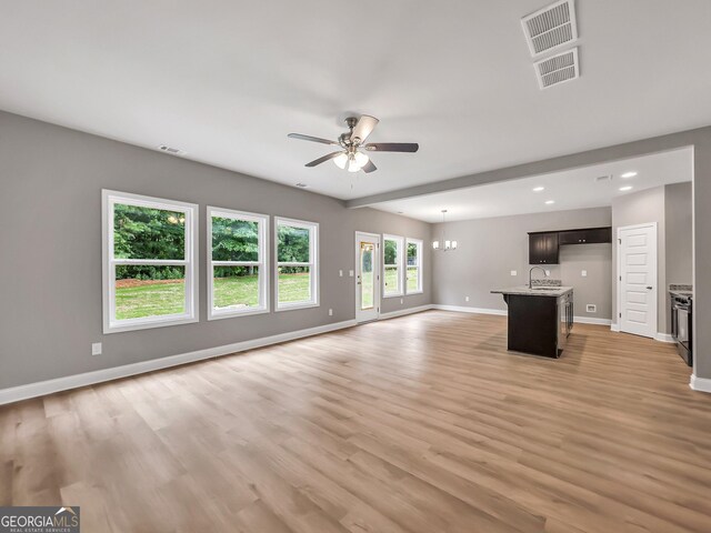 105 Hunts Mill Cir, Griffin, GA 30224 - unfurnished living room with ceiling fan, light wood-style flooring, and recessed lighting