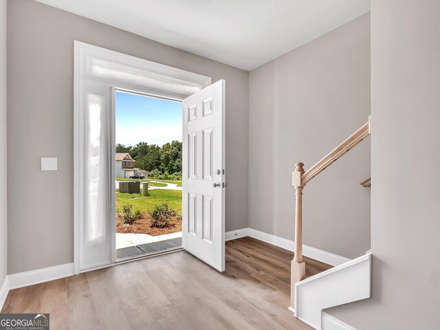 105 Hunts Mill Cir, Griffin, GA 30224 - entrance foyer with wood finished floors and stairway