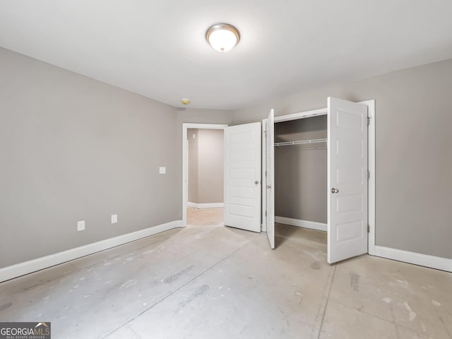 105 Hunts Mill Cir, Griffin, GA 30224 - unfurnished bedroom with a closet and concrete floors
