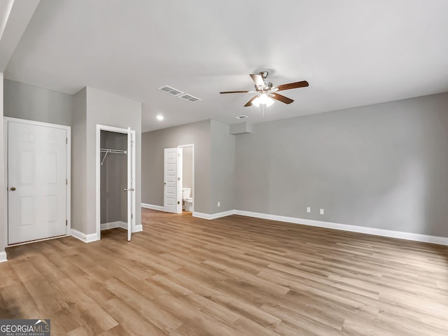 105 Hunts Mill Cir, Griffin, GA 30224 - unfurnished bedroom with light wood finished floors, connected bathroom, ceiling fan, and recessed lighting