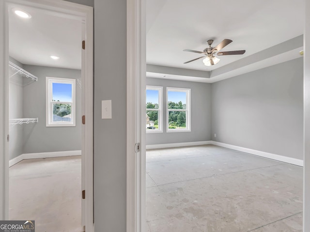 105 Hunts Mill Cir, Griffin, GA 30224 - empty room with plenty of natural light, a ceiling fan, concrete floors, and recessed lighting