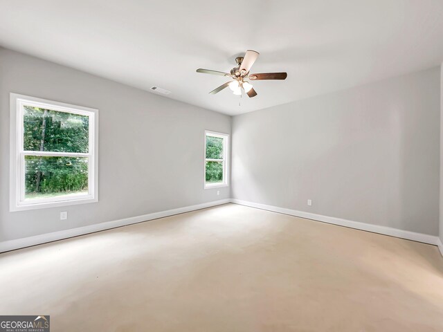 131 Hunts Mill Cir, Griffin, GA 30224 - spare room featuring ceiling fan and baseboards