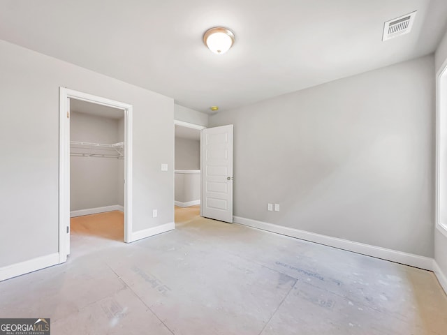 131 Hunts Mill Cir, Griffin, GA 30224 - unfurnished bedroom featuring a spacious closet and a closet