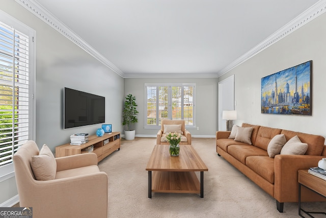 living area featuring baseboards, light colored carpet, and crown molding