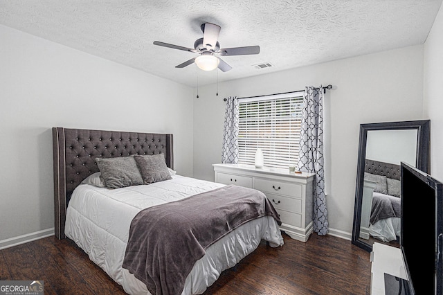 287 Players Cir, Fayetteville, GA 30215 - bedroom with baseboards, visible vents, wood finished floors, and a textured ceiling