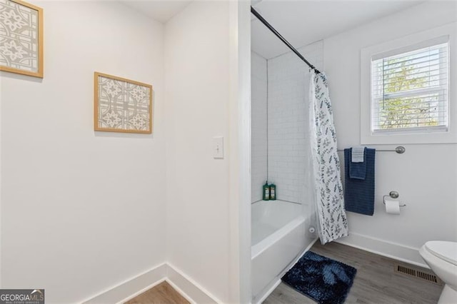 587 Oak Trce, Jasper, GA 30143 - full bathroom featuring wood finished floors and shower / tub combo
