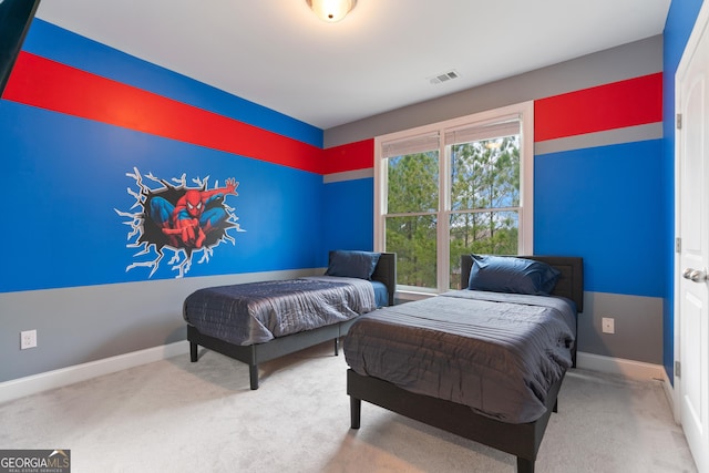 bedroom featuring baseboards, visible vents, and carpet