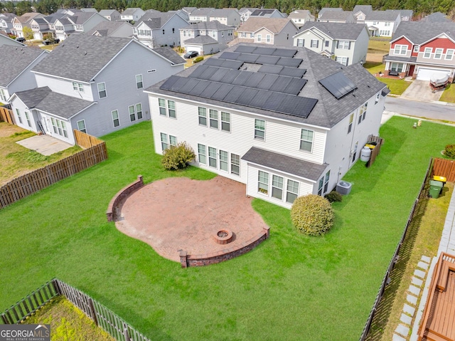 birds eye view of property with a residential view