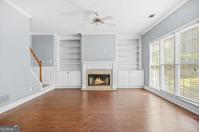 4522 Willow Oak Trl, Powder Springs, GA 30127 - unfurnished living room with a ceiling fan, a fireplace, wood finished floors, visible vents, and ornamental molding