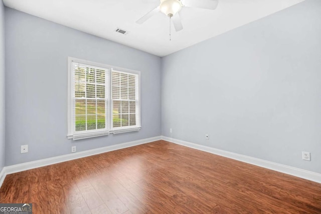 4522 Willow Oak Trl, Powder Springs, GA 30127 - unfurnished room featuring baseboards, visible vents, and wood finished floors