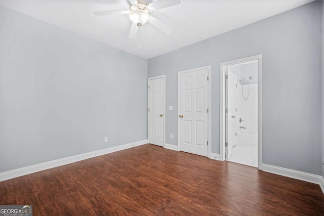 4522 Willow Oak Trl, Powder Springs, GA 30127 - unfurnished bedroom featuring a ceiling fan, ensuite bath, baseboards, and wood finished floors