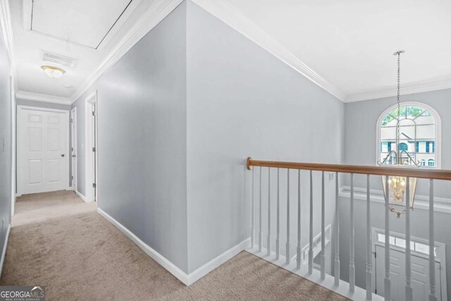 4522 Willow Oak Trl, Powder Springs, GA 30127 - hallway featuring carpet, attic access, baseboards, visible vents, and ornamental molding