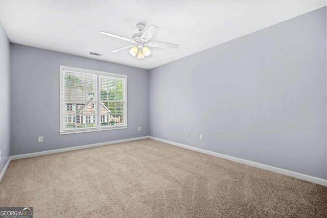 4522 Willow Oak Trl, Powder Springs, GA 30127 - empty room featuring baseboards, visible vents, ceiling fan, and carpet