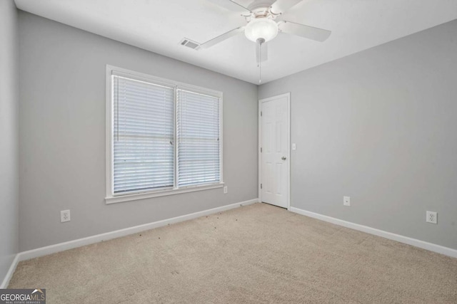 4522 Willow Oak Trl, Powder Springs, GA 30127 - empty room with baseboards, carpet flooring, ceiling fan, and visible vents