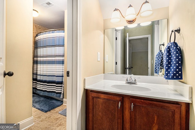 7497 Treehouse Ct, Douglasville, GA 30135 - bathroom with visible vents, tile patterned flooring, vanity, baseboards, and a shower with shower curtain
