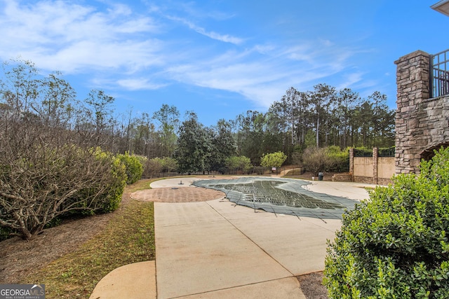7497 Treehouse Ct, Douglasville, GA 30135 - view of swimming pool with a patio, fence, and a covered pool